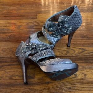 Poetic License Metallic Heels with Embellished Bow